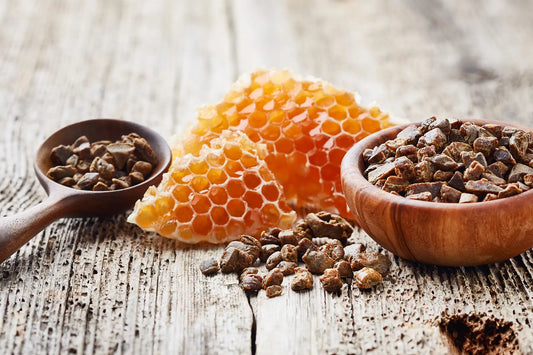 Propolis and honeycomb in wooden spoon natural skincare ingredient